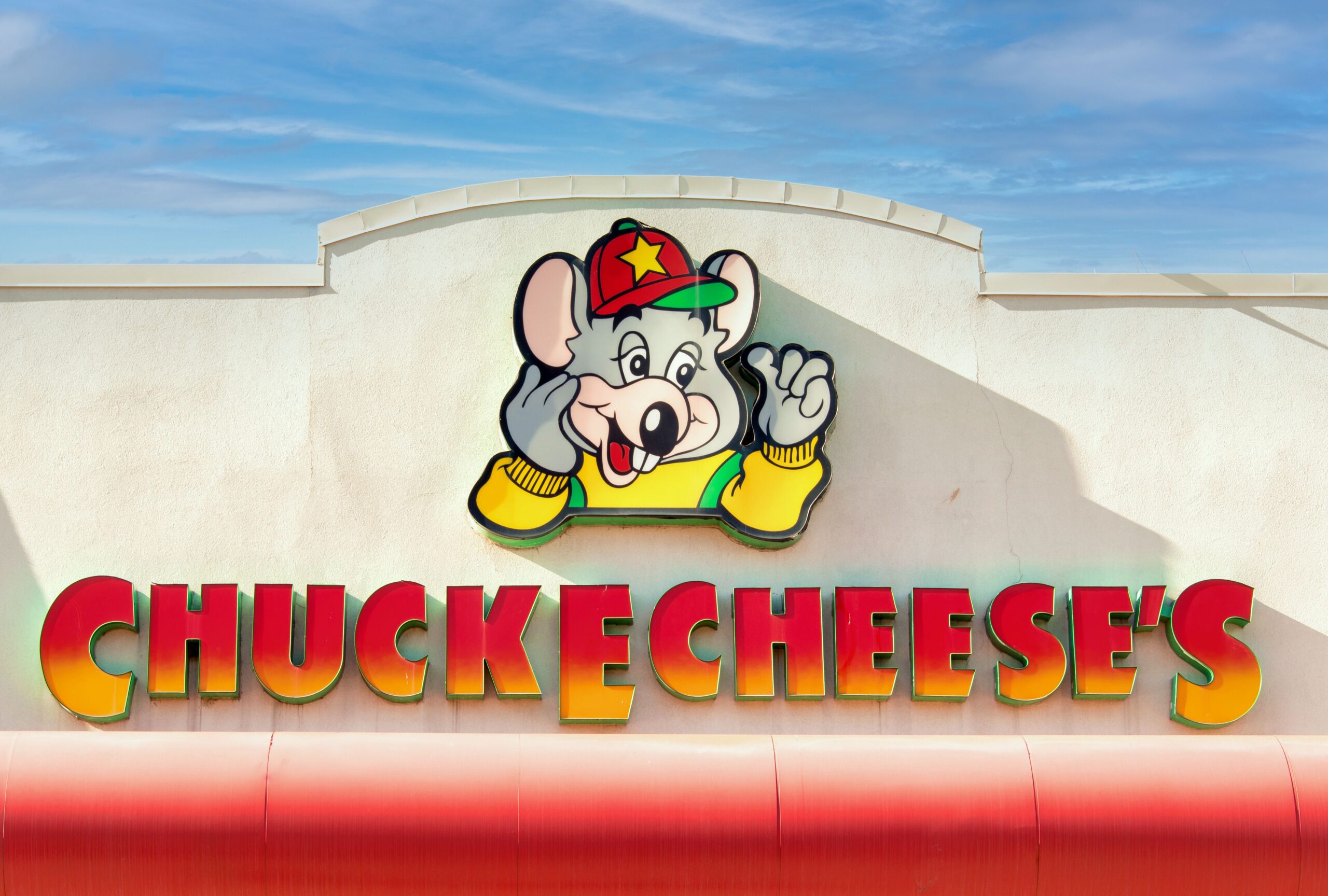 Entrance sign to a Chuck E. Cheese restaurant and entertainment business in Toronto, Canada.